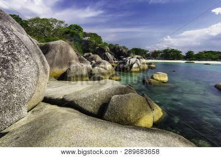View Of A Group Of Big Stones On The Tanjung Tinggi Beach From Island Belitung/indonesia/