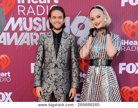 Zedd and Katy Perry at the 2019 iHeartRadio Music Awards held at the Microsoft Theater in Los Angeles, USA on March 14, 2019.