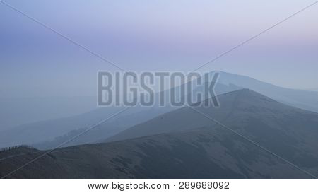 Beautiful Winter Sunrise Landscape Image Of The Great Ridge In The Peak District In England With Mis
