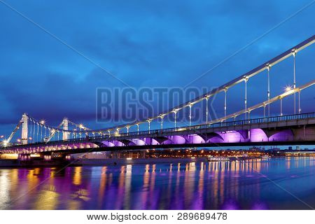 Krymsky Bridge Or Crimean Bridge  Across The Moskva River In Moscow In The Rays Of Setting Sun In Th
