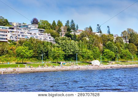Oceanfront Houses Along White Rock Beach On Semiahmoo Bay In British Columbia, Canada. The Quaint Se