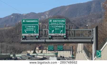 Highway Sign With The Signs Of The Junction To Go To Florence In Tuscany On The Panoramic Road Or On
