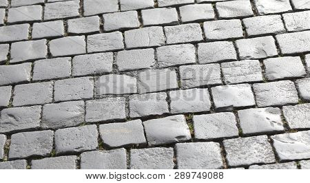 Background Of Sampietrini Pavement Made With Cobblestones In Saint Peter Square In Vatican City
