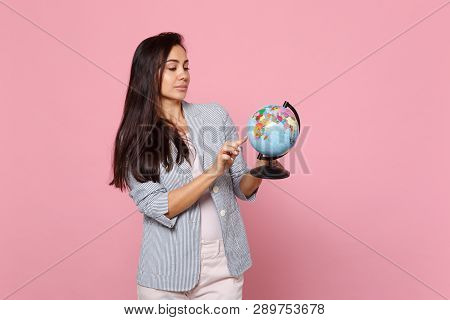 Beautiful Young Woman In Striped Jacket Holding Pointing Index Finger On Earth World Globe Isolated 