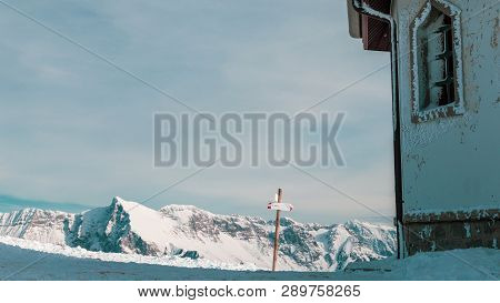 A Church On The Top Of Italian Alps In A Cold Winter Day