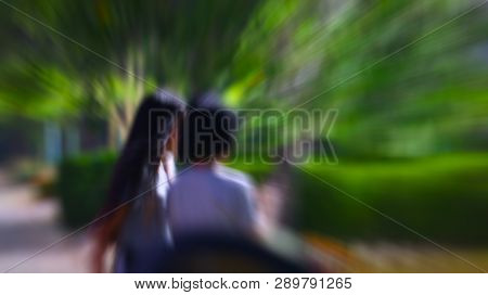 Blurred Image Two Young Women Are Sitting Chatting
