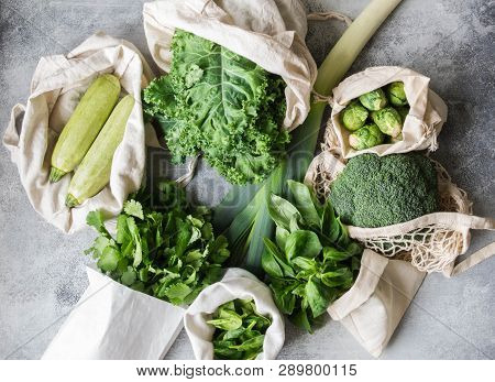 Healthy Green Vegan Ingredients For Cooking. Various Clean Green Vegetables And Herbs In Textile Bag
