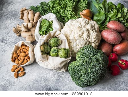 Healthy Vegan Ingredients For Cooking. Various Clean Vegetables And Herbs On Marble Background. Prod