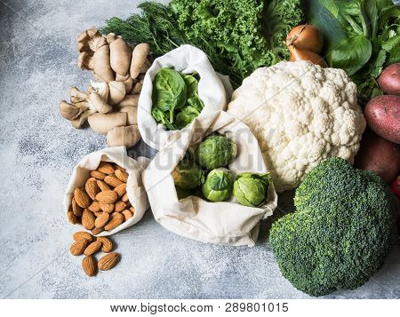 Healthy Vegan Ingredients For Cooking. Various Clean Vegetables And Herbs On Marble Background. Prod