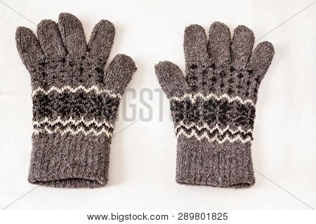 Warm Mittens Made Of Natural Wool Isolated White Background.