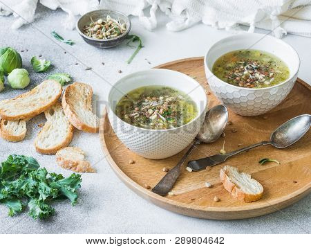 Green Vegetable Vegan Soup From Keil, Brussels Sprouts, Zucchini, Leek With Various Germinated Seeds