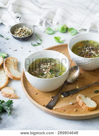 Green Vegetable Vegan Soup From Keil, Brussels Sprouts, Zucchini, Leek With Various Germinated Seeds