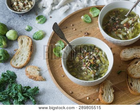 Green Vegetable Vegan Soup From Keil, Brussels Sprouts, Zucchini, Leek With Various Germinated Seeds