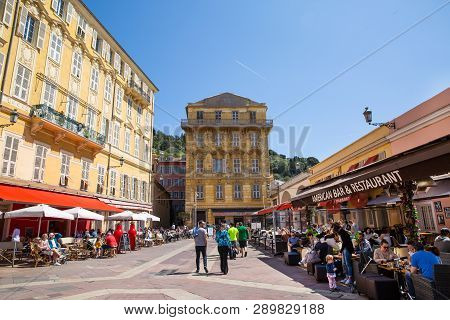 Nice, France - April 18 2017. Restaurant In Old Town Of Nice. Colorful Old Medieval Architecture.