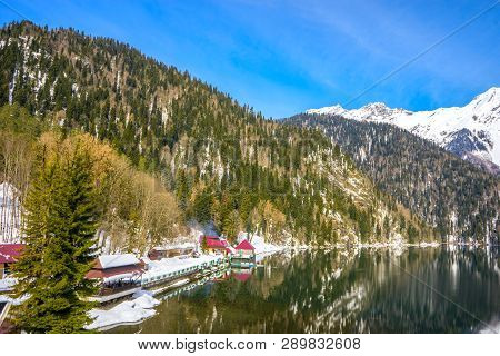 A Small Embankment On The Shore Of A Beautiful Mountain Lake