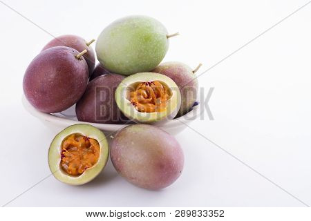 Fruits Of Gulupa On Vine Wood Table, Passiflora Pinnatistipula