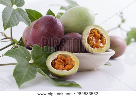 Fruits Of Gulupa On Vine Wood Table, Passiflora Pinnatistipula