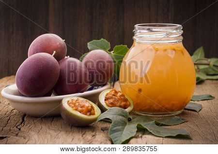 Fruits Of Gulupa On Vine Wood Table, Passiflora Pinnatistipula