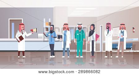 Arab Male Doctor Holding Loudspeaker Shouting Through Megaphone Arabic Doctors Team Meeting Conferen