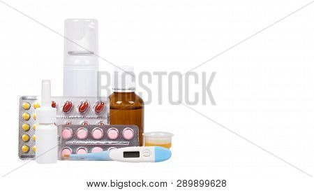 Bottle With Medicine, Nasal Spray. Antipyretic Syrup And Pills. Medication For Cold Treatment