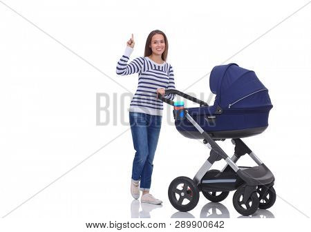 Full length portrait of a mother with a stroller, isolated on white background. Young mom