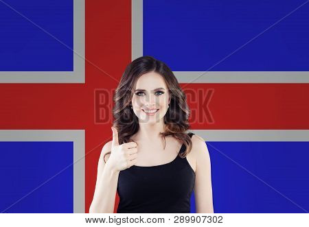 Iceland Concept With Happy Woman Against The Icelandic Flag Background. Travel And Learn Icelandic L