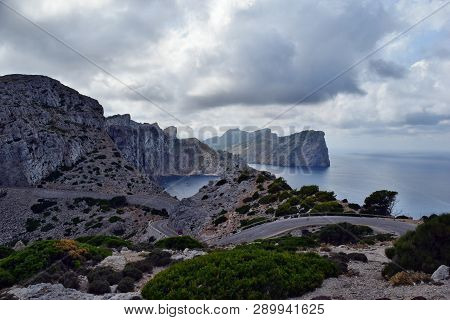 Amazing Landscape When Driving On An Open Coastal Road Winding Through To Lighthouse Cap Formentor, 