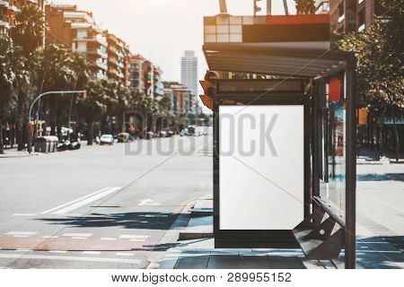 A Template Of A Blank Advert Poster Inside Of A Bus Stop; Vertical Information Banner Mockup Placeho