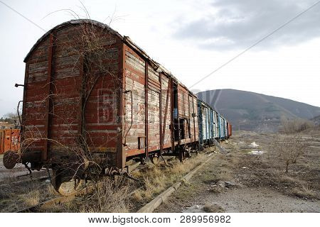 Abandoned Old Railway Wagons At Station, Old Train Wagons In An Abandoned Station