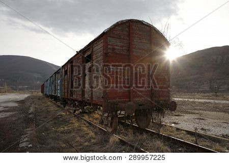 Abandoned Old Railway Wagons At Station, Old Train Wagons In An Abandoned Station