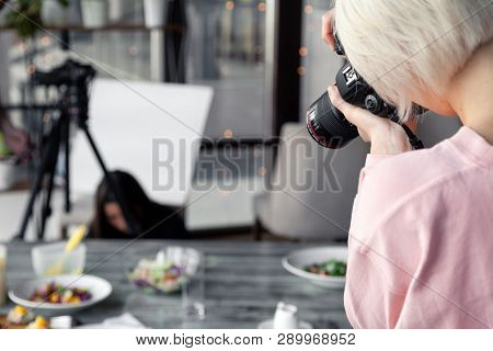 Russia Kemerovo 2019-03-10 Girl Photographer Taking Pictures On Professional Camera Canon 5D Mark Iv