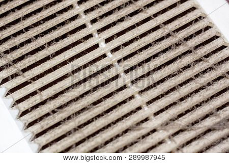 Cleaning Ventilation Plastic Frame Dust. The Filter Is Completely Clogged With Dust And Dirt. Dirty 