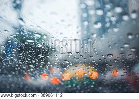 Driving Car On Road In The Rain With Raindrop Over The Wind Shield, Traffic Jam In Rainy Season
