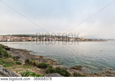 Panorama View Of Sanxenxo And Silgar Beach At The End Of A Cloudy Summer Day In The Rias Baixas In G