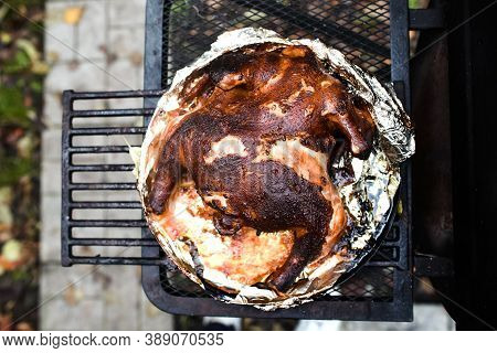 Grilled Grilled Burned Chicken, Top View. Outdoor Barbecue. Unsuccessful Picnic