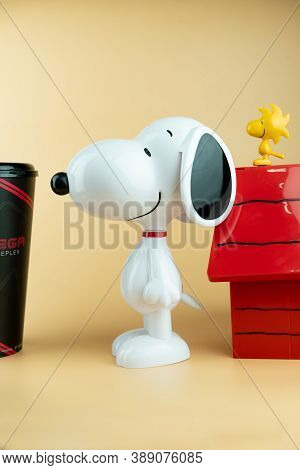 Samut Prakan, Thailand - October 10, 2020 : Set Of Popcorn Bucket And Drink Cup Of Cartoon Snoopy An