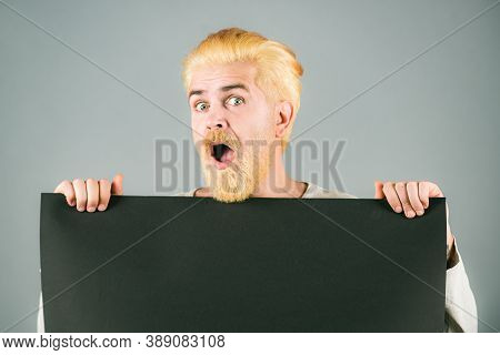 Man Showing Blank Paper. Copy Space On Paper. Portrait Of Man Holding Sign Card. Booklet Design Shee