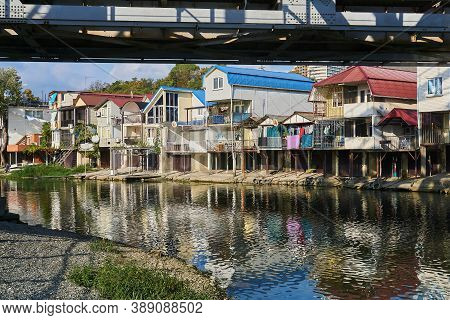 Sochy, Russia - September 14, 2020: The Bank Of The Dagomys River Is Entirely Built Up With Small Co