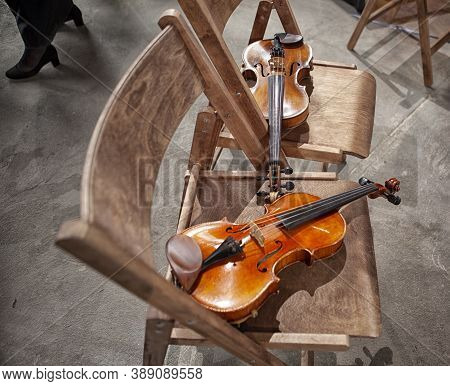 Cellos And Violas At Rest Before The Concert.