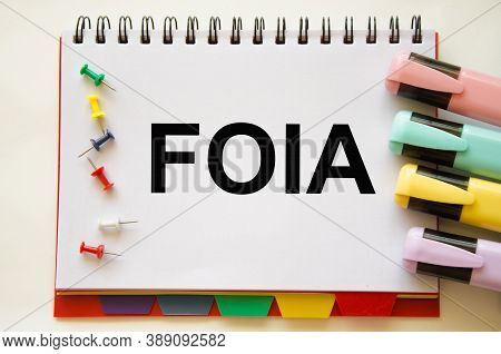 Focused On The Business Concept. Magnifier Glass With The Word Foia Freedom Of Information Act On A 