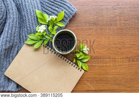 Notbook Planner For Business Work, Hot Coffee Espresso And Knitting Wool Scarf Of Lifestyle Arrangem