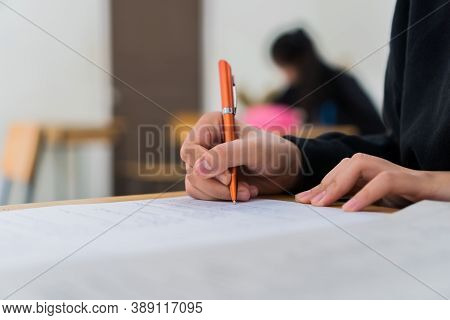 Hands Student Testing In Exam On Exercise Taking At High School Or University In Test Room. Writing 