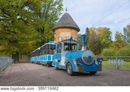 Pavlovsk, Russia - September 28, 2020: Tourist Train Against The Background Of The Pil Tower On A Se
