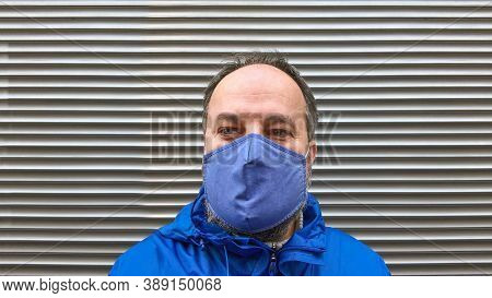 Middle Aged Man Wearing Cloth Face Mask Or Community Mask Or Everyday Mask During Corona Covid-19 Pa