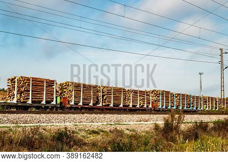 Kouvola, Finland - 24 September 2020: Railway Carriages With Timber At Paper Mill Stora Enso