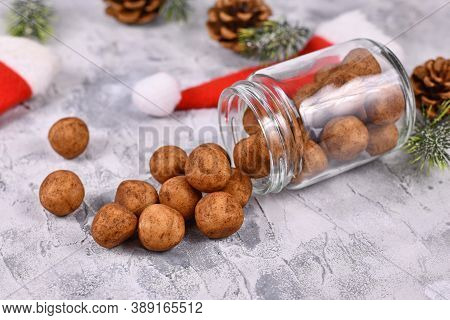 Traditional German Christmas Sweets Called 'marzipankartoffeln'. Round Ball Shaped Almond Paste Piec