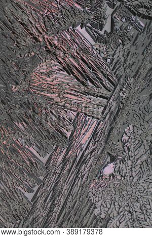 Crystals Of Frozen Water Close-up. Ice And Frost On Window Pane In Winter. Abstract Pattern. Weather