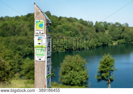 Schalkenmehren, Germany - June 23, 2020: Long Distance Hiking Trail Eifelsteig With Focus On The Typ