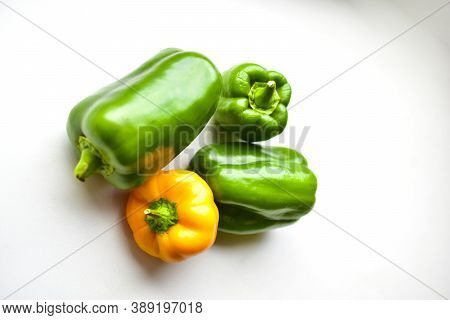Yellow Green Regular Pepper On A White Background