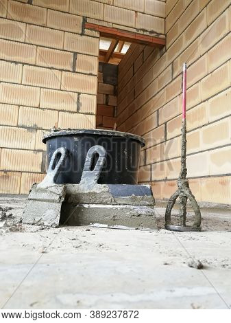 Taping Knifes And Cement Bucket(construction Work Tools) For Constructions At Construction Site